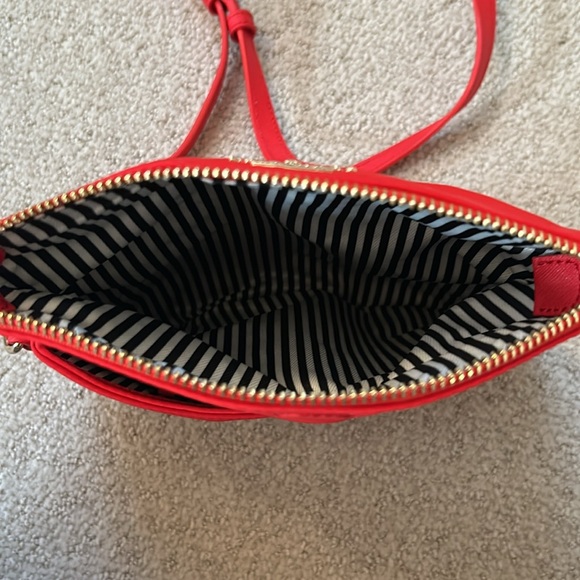 Kate Spade Red cross body purse. Fold over flap style. Zip pocket on front. - Picture 6 of 14
